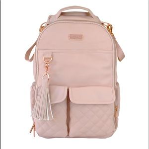 Blush Itzy Ritzy diaper bag.
